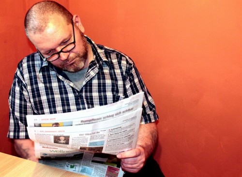 A man Reading Newspaper